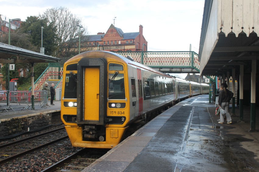 A 4 car train arrives at Newtown